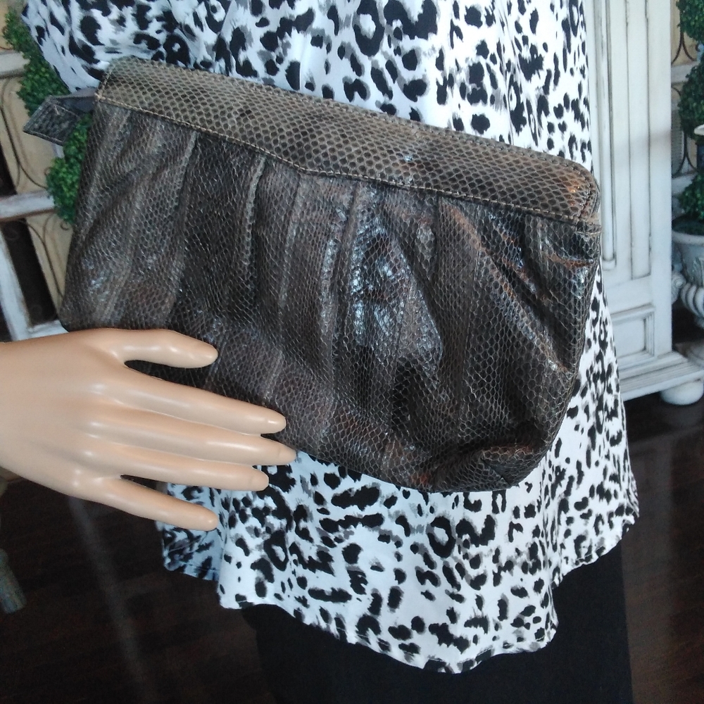 Gray snakeskin clutch